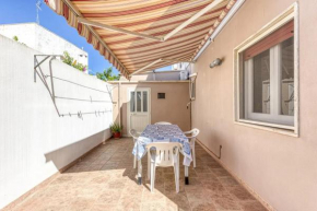 Appartamento climatizzato al centro del paese con patio esterno